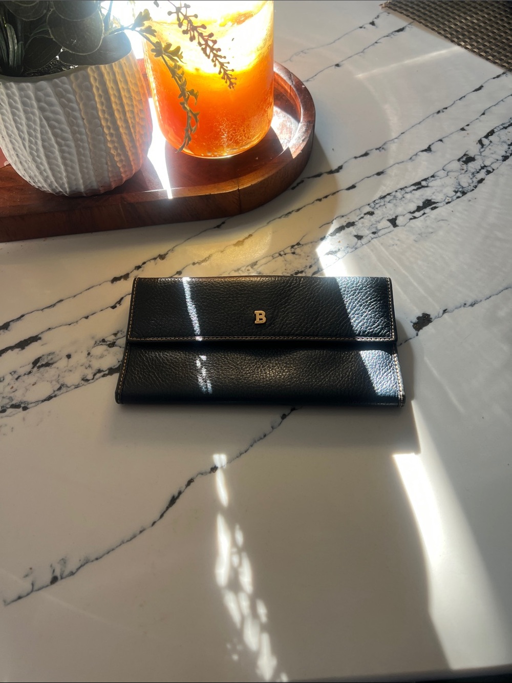 Bally Black Pebbled Leather Fold Wallet with Gold 'B' Accent